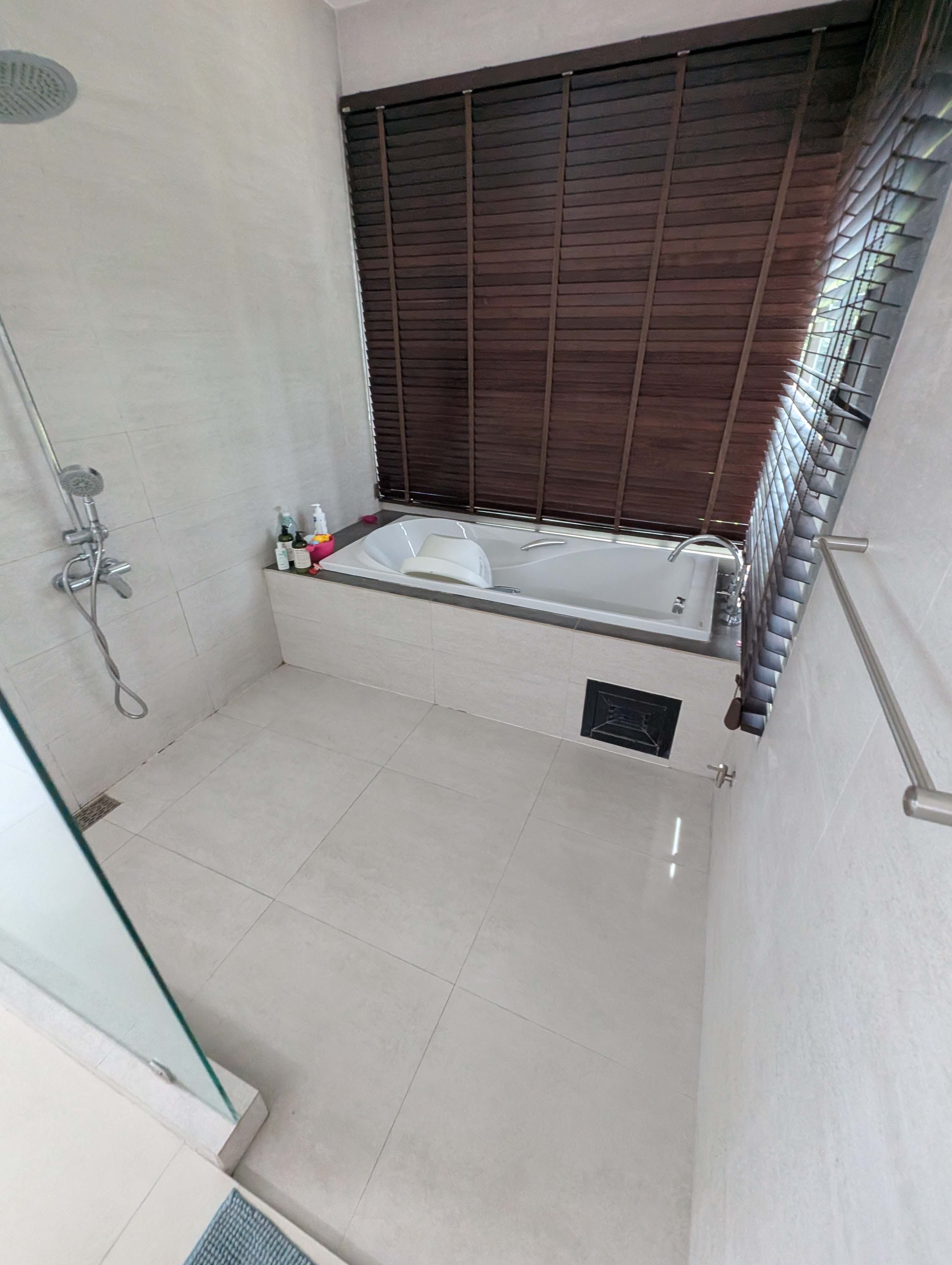 Bathroom with a bathtub and a separate glass shower